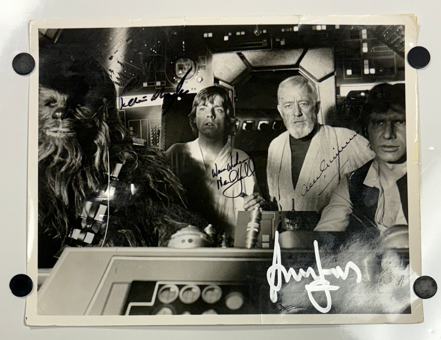 
                  
                    Alec Guinness as Obi-Wan Kenobi, Harrison Ford as Han Solo, Mark Hamill as Luke Skywalker, & Peter Mayhew as Chewbacca in Star Wars: A New Hope Falcon Cockpit (Beckett Witnessed / K9) Signed 8x10 Photo
                  
                
