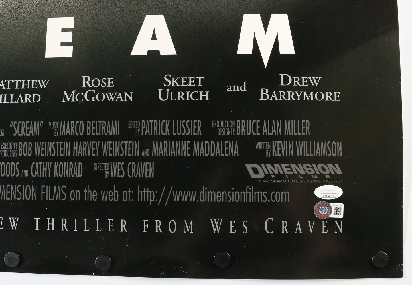 
                  
                    Neve Campbell as Sidney Prescott, Matthew Lillard as Stu Macher, & Skeet Ulrich as Billy Loomis in Wes Craven's Scream (Beckett Witnessed / JSA) Signed 27x40 Poster with Character Names
                  
                