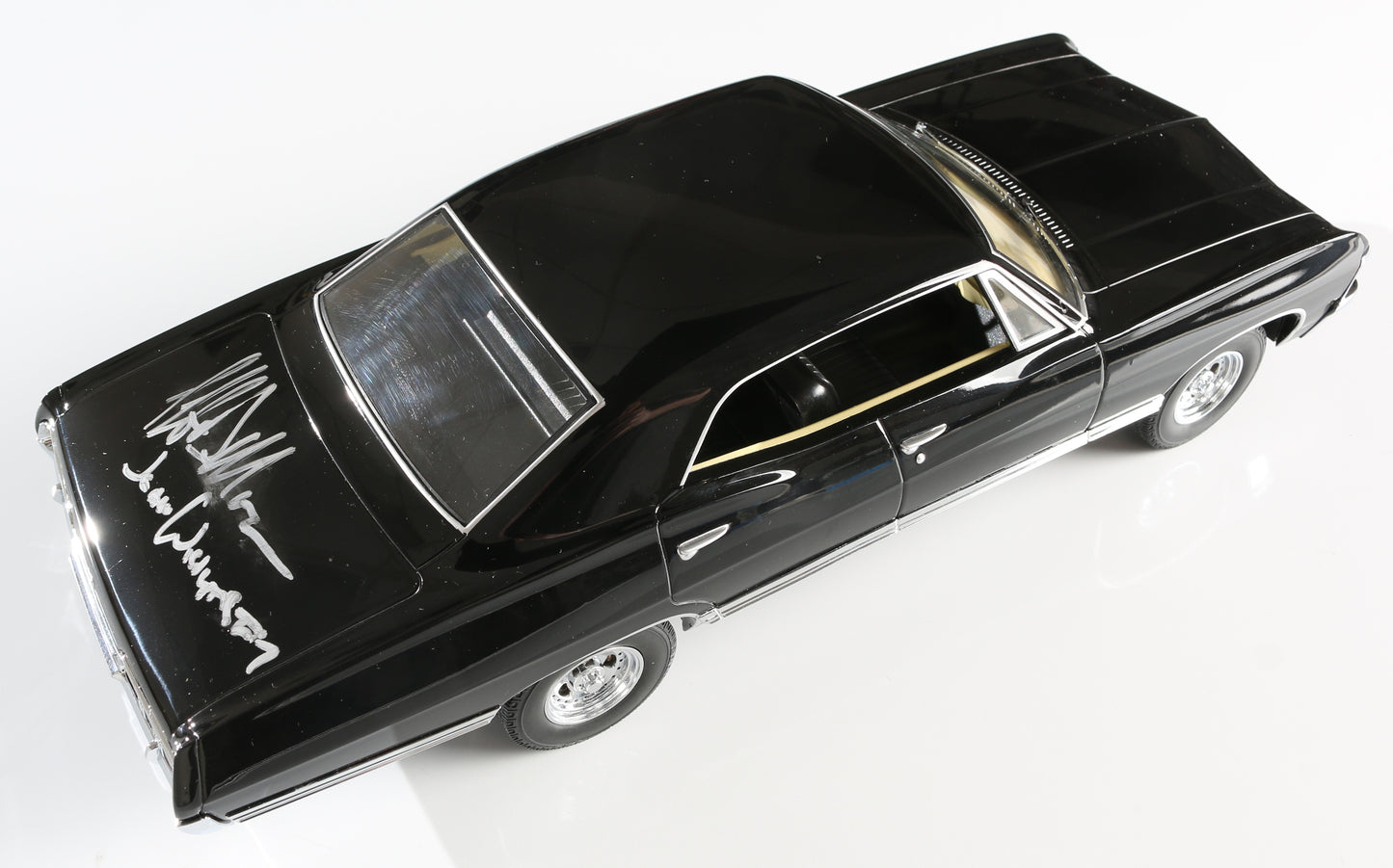 
                  
                    Jeffrey Dean Morgan as John Winchester in Supernatural Signed Greenlight Artisan 1:18 Scale Model 1967 Chevrolet Impala Sport Sedan with Character Name
                  
                