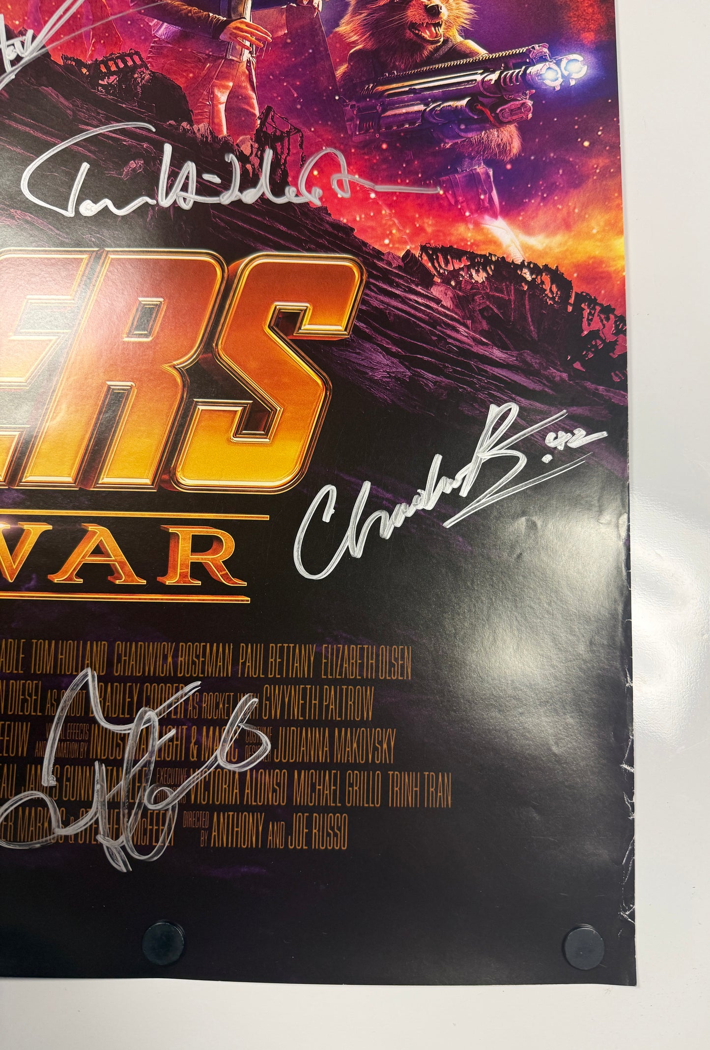 
                  
                    Avengers: Infinity War 27x40 Poster Cast Signed by Chadwick Boseman, Paul Bettany, Elizabeth Olsen, Josh Brolin, Anthony Mackie, Dania Gurira, Letitia Wright, Mark Ruffalo, Tom Holland, Don Cheadle, Chris Pratt, Tom Hiddleston, & Winston Duke
                  
                