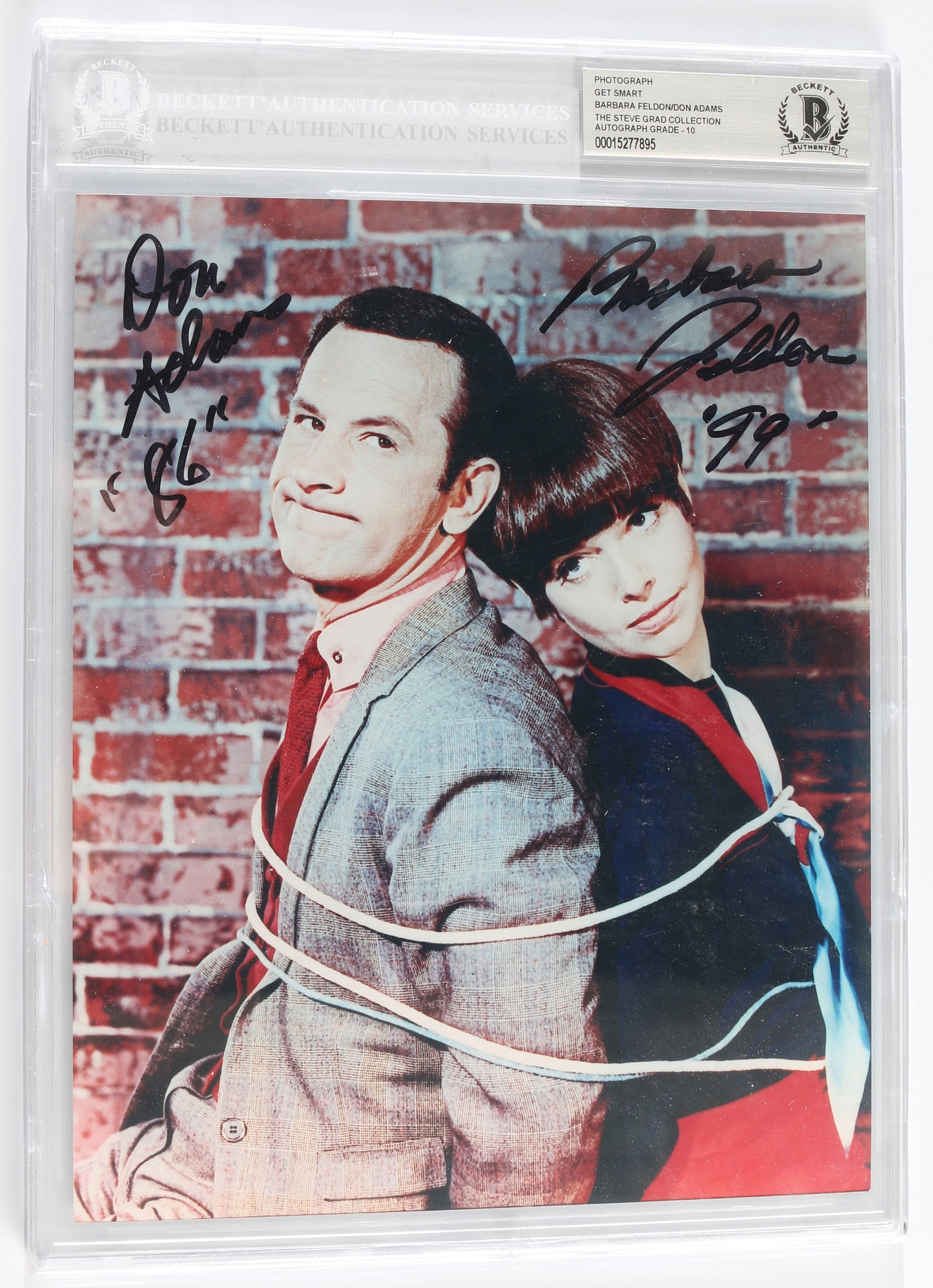 
                  
                    Don Adams as Maxwell Smart & Barbara Feldon as Agent 99 in Get Smart (Beckett Encapsulated) Signed 8x10 Photo
                  
                