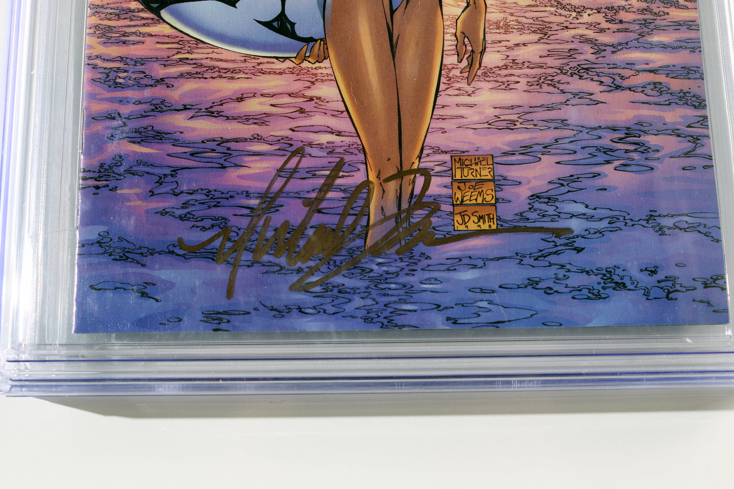 
                  
                    Fathom #0 - Signed by Artist & Creator: Michael Turner - Wizard Green Holofoil (CGC Signature Series 9.8) 1998
                  
                