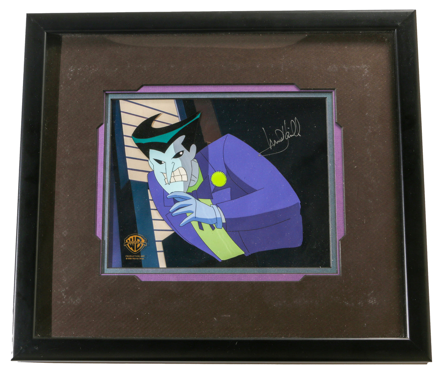 
                  
                    Mark Hamill as the Joker in Batman: The Animated Series 'Holiday Knights' Framed Signed Production Art Film Cel
                  
                