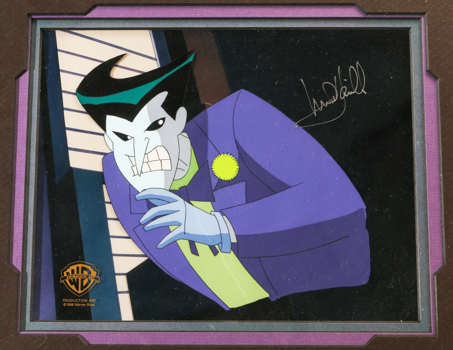 
                  
                    Mark Hamill as the Joker in Batman: The Animated Series 'Holiday Knights' Framed Signed Production Art Film Cel
                  
                