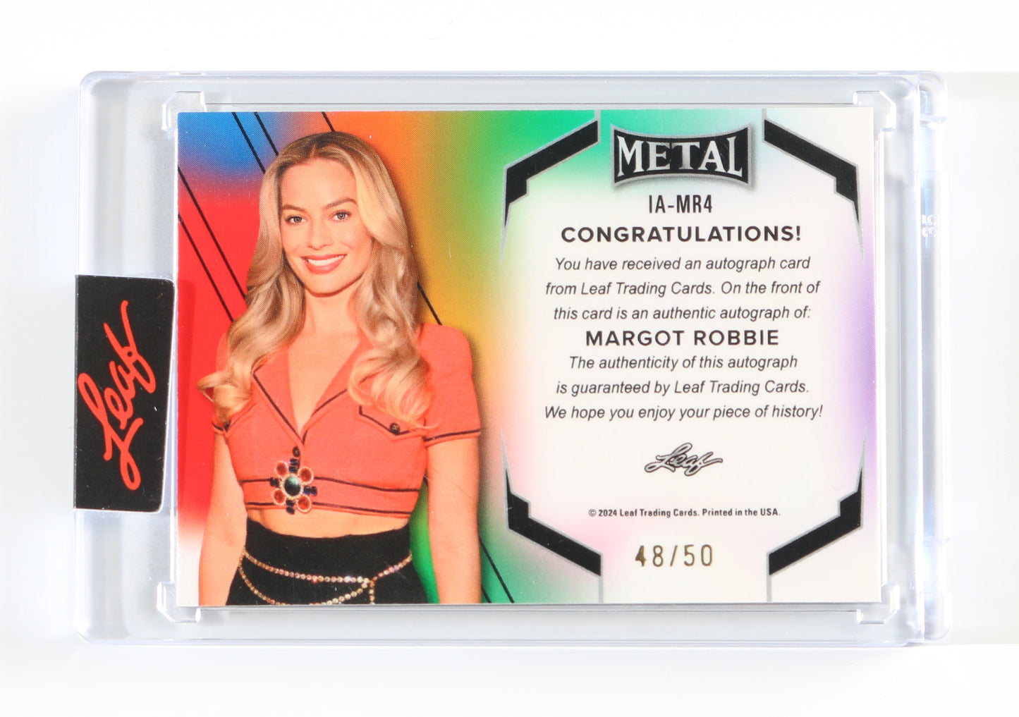 
                  
                    Margot Robbie from Barbie, The Wolf of Wall Street, & DC's Harley Quinn Signed Leaf Metal Trading Card #IA-MR4 Limited Edition #48/50
                  
                