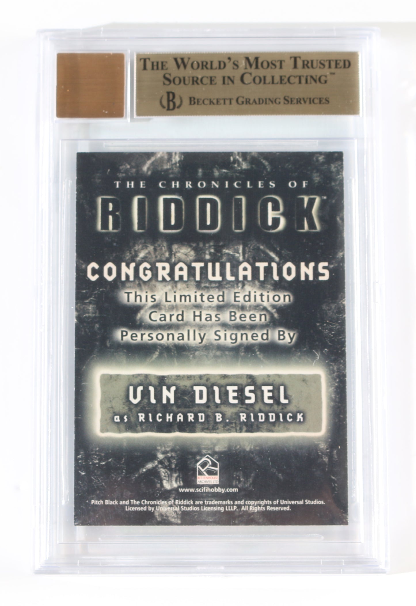 
                  
                    Vin Diesel as Richard B. Riddick in The Chronicles of Riddick (Beckett Encapsulated) Signed 2004 Rittenhouse Trading Card #A1
                  
                