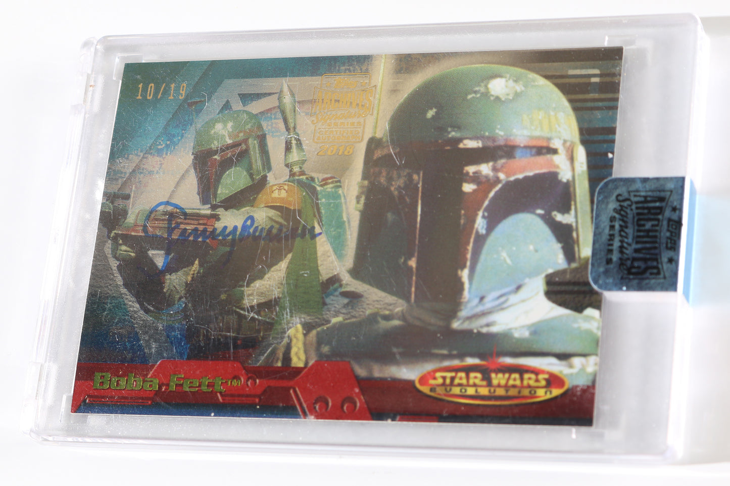 
                  
                    Jeremy Bulloch as Boba Fett in Star Wars: Return of the Jedi Signed Topps Star Wars Evolution Trading Card #11 Limited Edition #10/19
                  
                