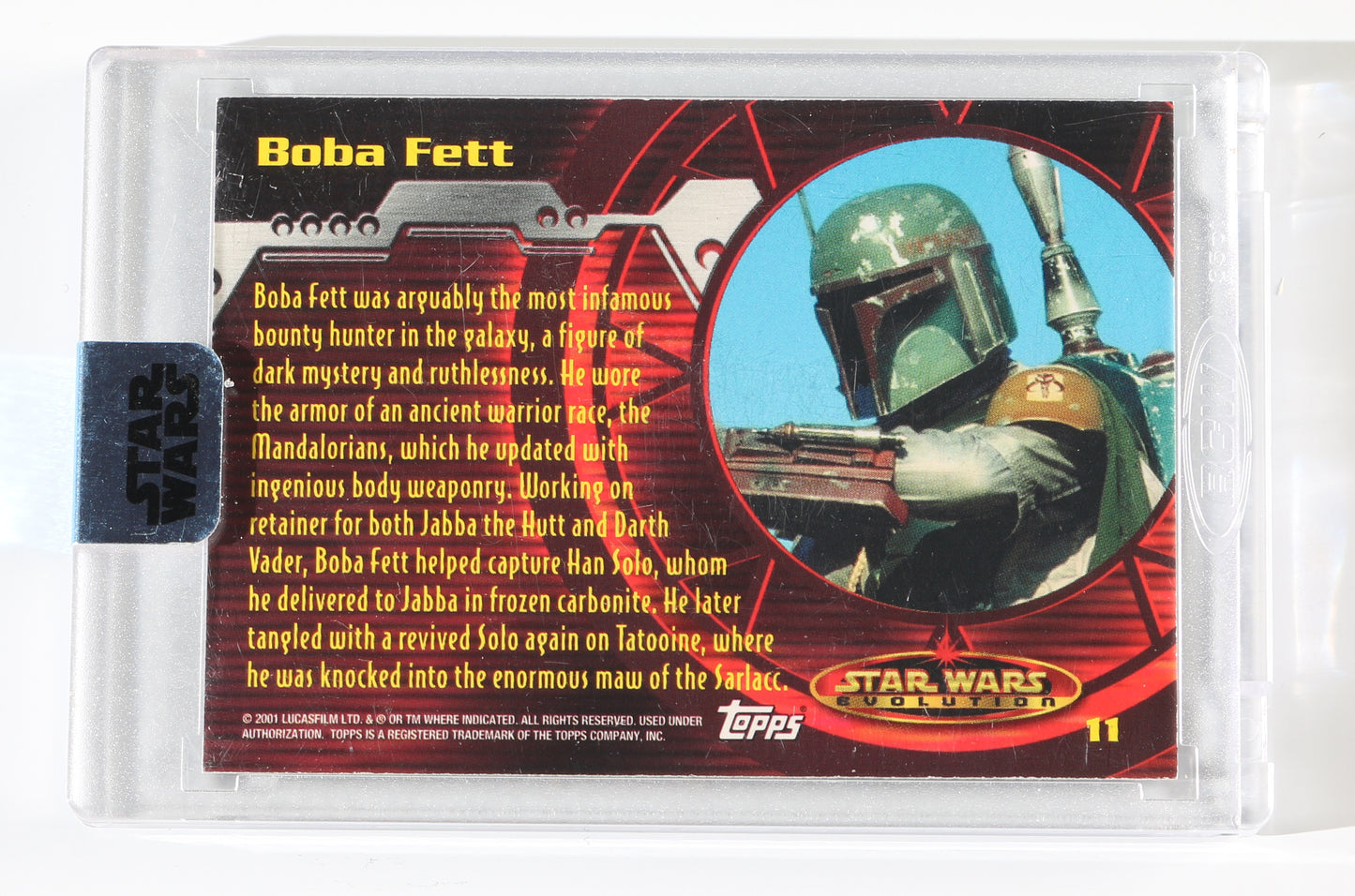 
                  
                    Jeremy Bulloch as Boba Fett in Star Wars: Return of the Jedi Signed Topps Star Wars Evolution Trading Card #11 Limited Edition #10/19
                  
                