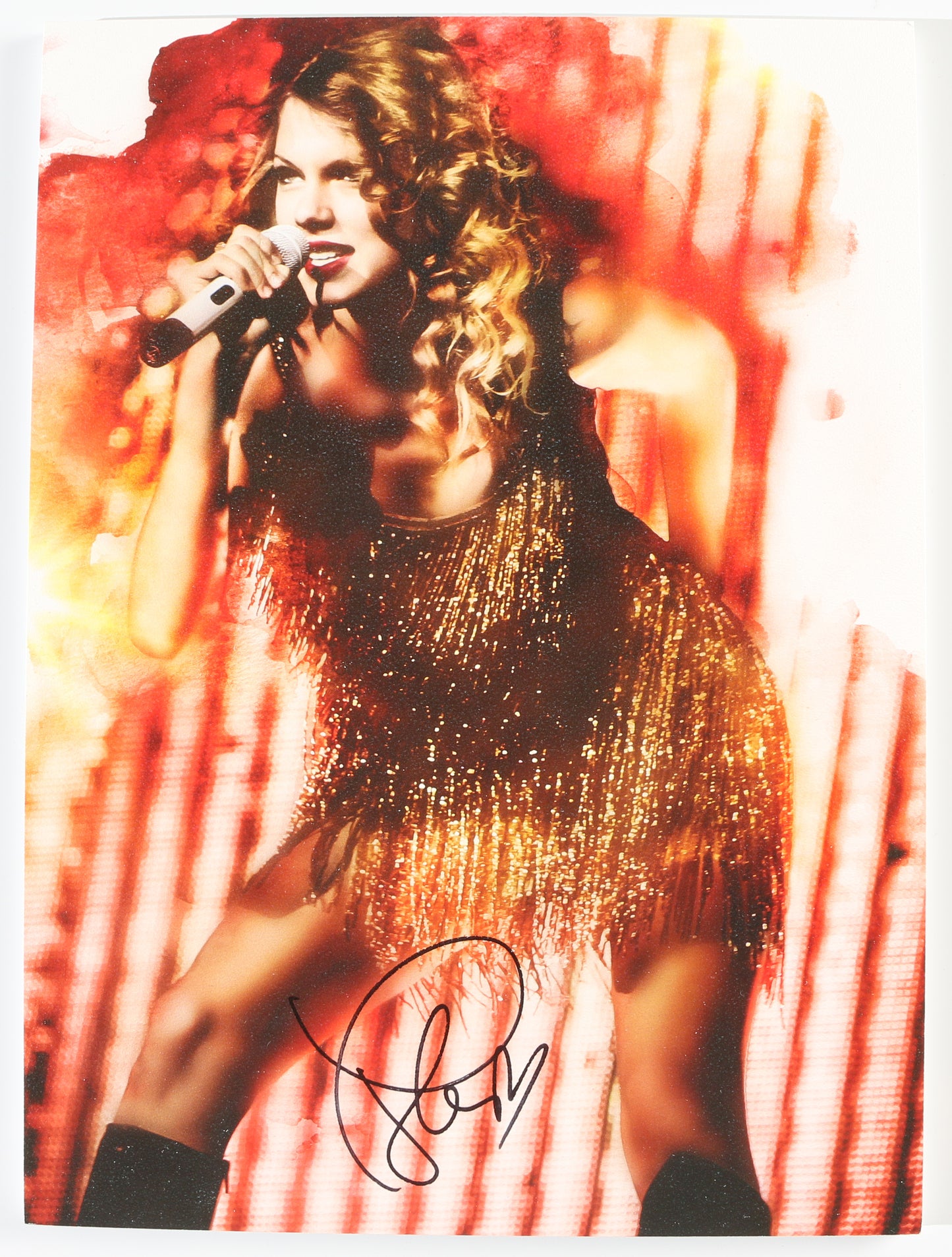 
                  
                    Taylor Swift Singer-Songwriter in Concert Signed 9x12 Photo
                  
                