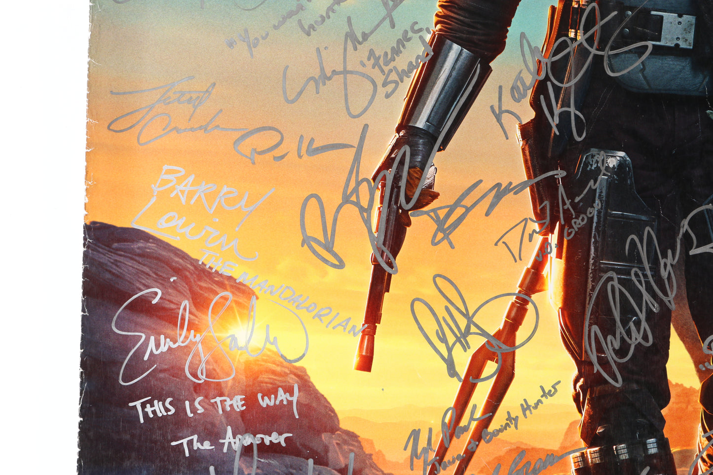 
                  
                    Star Wars: The Mandalorian 27x40 Poster Cast Signed by Dave Filoni, Jon Favreau, Pedro Pascal, Carl Weathers, Kathleen Kennedy, Mark Hamill, Werner Herzog, Ludwig Goransson, Taika Waititi, Rosario Dawson, Katee Sackhoff, Gina Carano, Ming-Na Wen, +66 More
                  
                