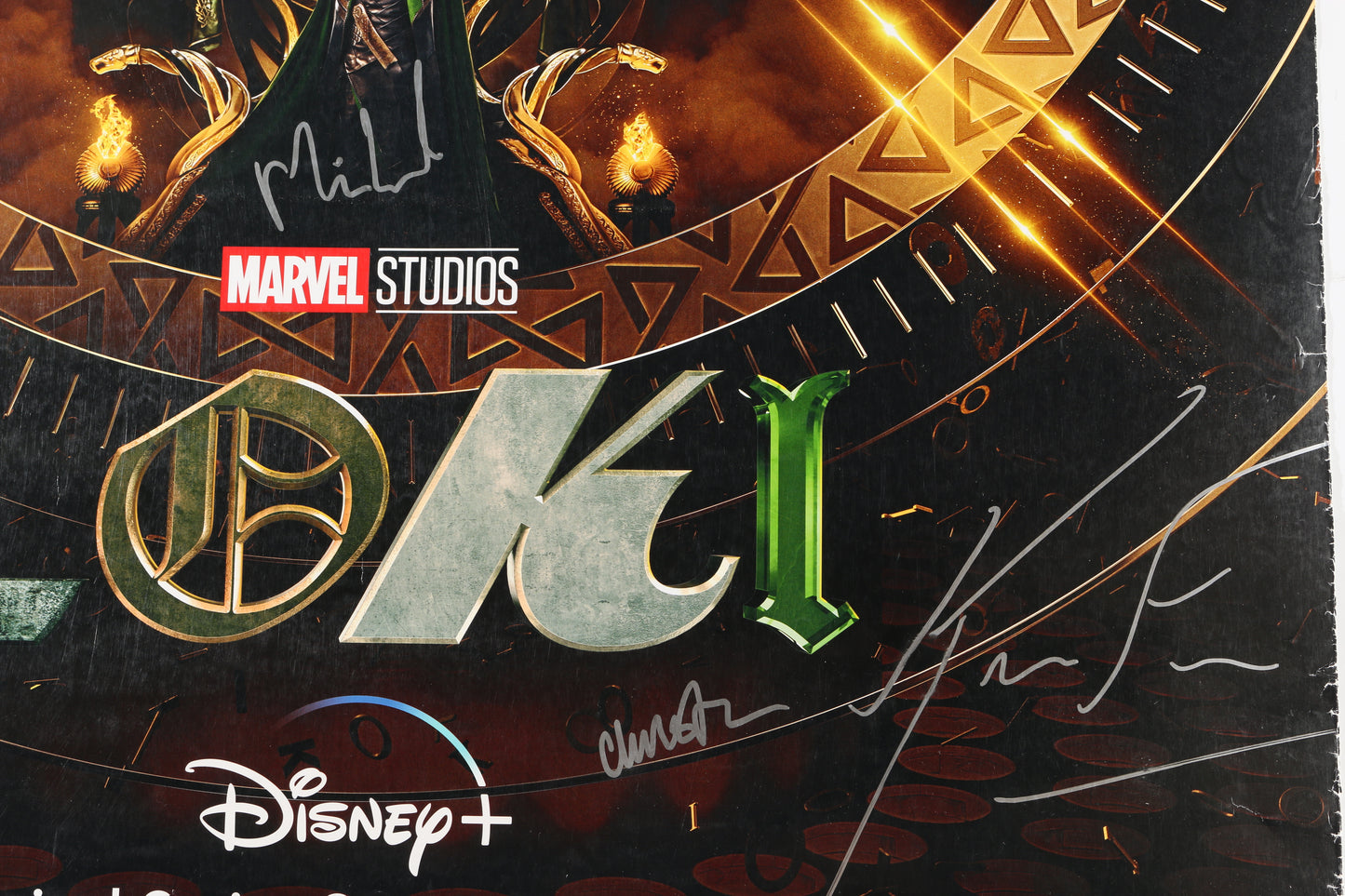 
                  
                    Loki 27x40 Poster Cast Signed by Tom Hiddleston, Jonathan Majors, Wunmi Mosaku, Tara Strong, Casting Director: Sarah Finn, Costume Designer: Christine Wada, Writer: Michael Waldron, & Producer: Kevin Feige
                  
                
