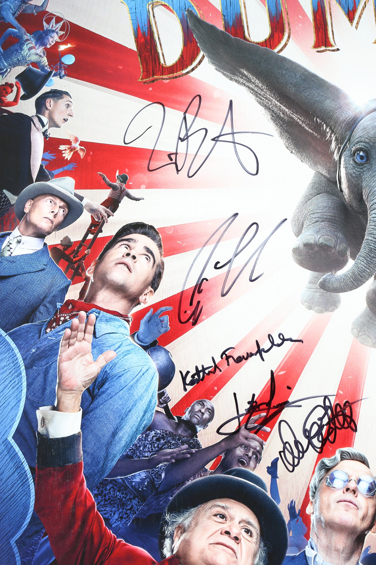 
                  
                    Dumbo 27x40 Poster Cast Signed by Colin Farrell, Michael Keaton, Danny Devito, Eva Green, Nico Parker, Finley Hobbins, Composer: Danny Elfman, & Director: Tim Burton
                  
                