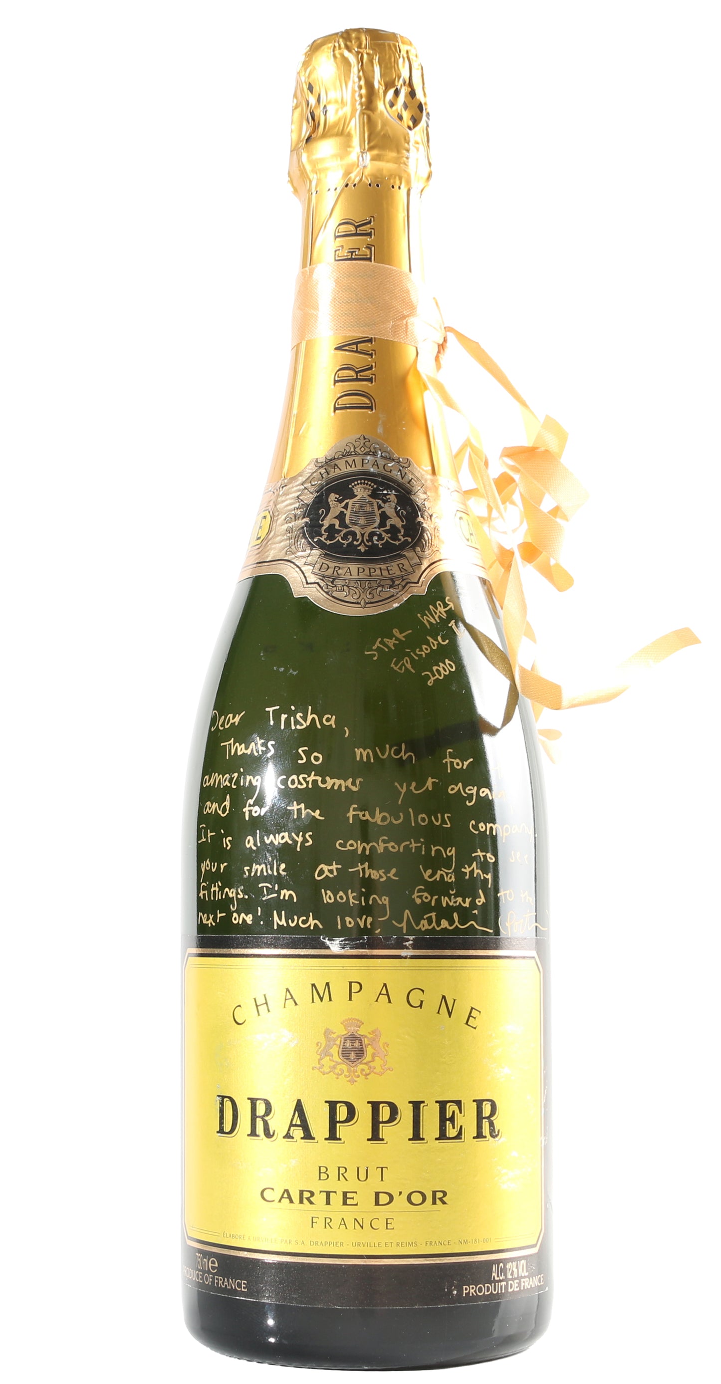 
                  
                    Natalie Portman from Star Wars Episode II: Attack of the Clones Signed Champagne Bottle Gift to Costume designer Trisha Biggar with Personal Thank You Note
                  
                