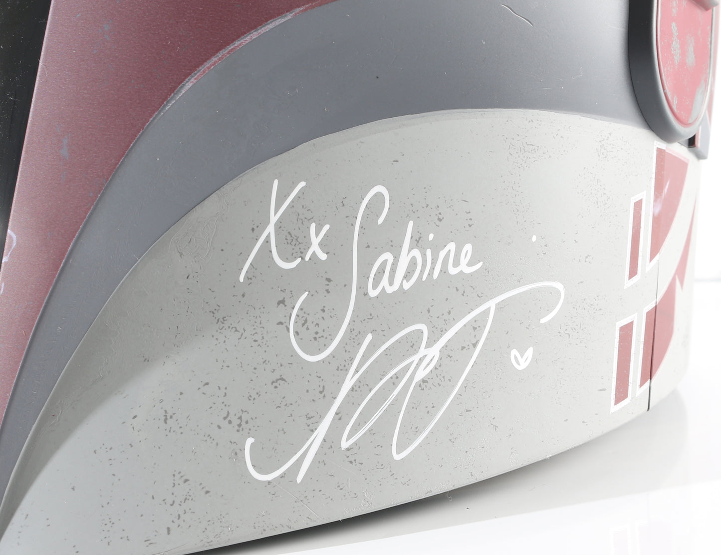 
                  
                    Sabine from Star Wars: Ahsoka Prop Replica Hasbro The Black Series Helmet (Beckett) Signed by Natasha Liu Bordizzo with Character Name
                  
                