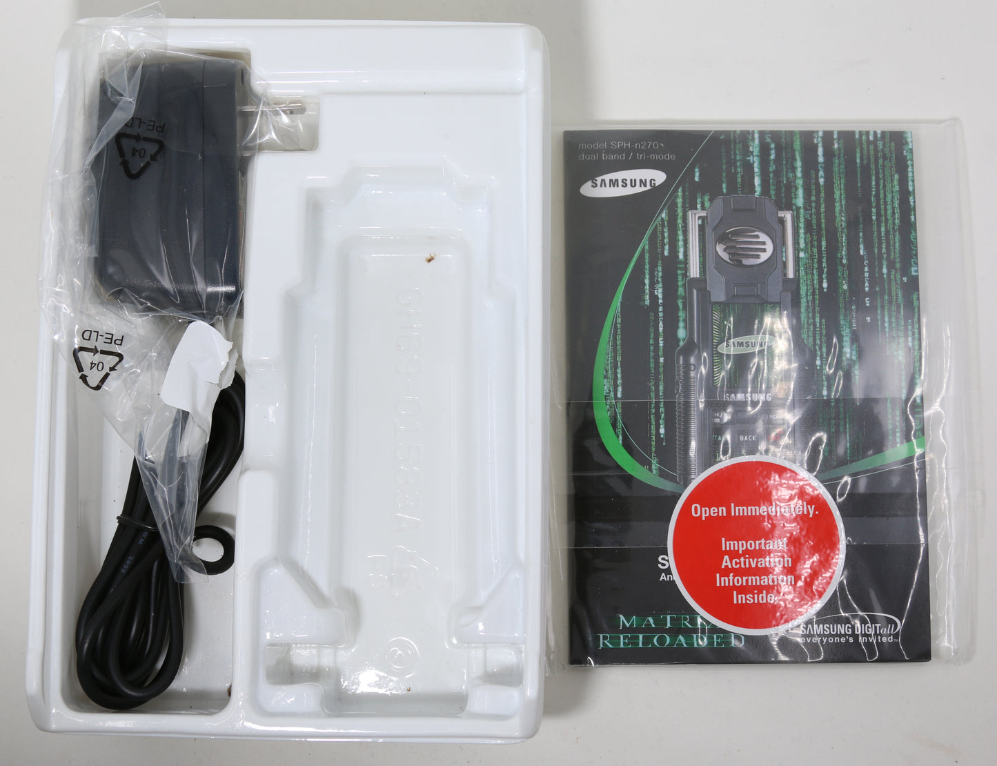 
                  
                    The Matrix Reloaded Limited Edition Cell Phone by Samsung From Producer Joel Silver's Collection - 2003
                  
                