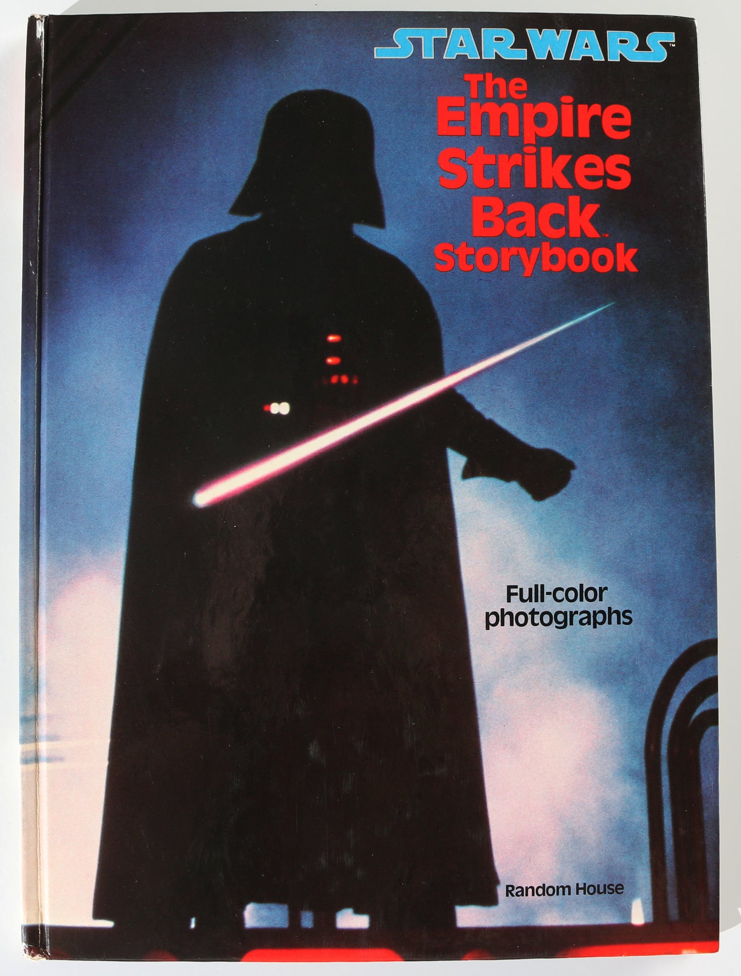 
                  
                    Mark Hamill as Luke Skywalker, Dave Prowse as Darth Vader, & Billy Dee Williams as Lando Calrissian in Star Wars: The Empire Strikes Back Vintage Signed Storybook with Character Name & Quote
                  
                