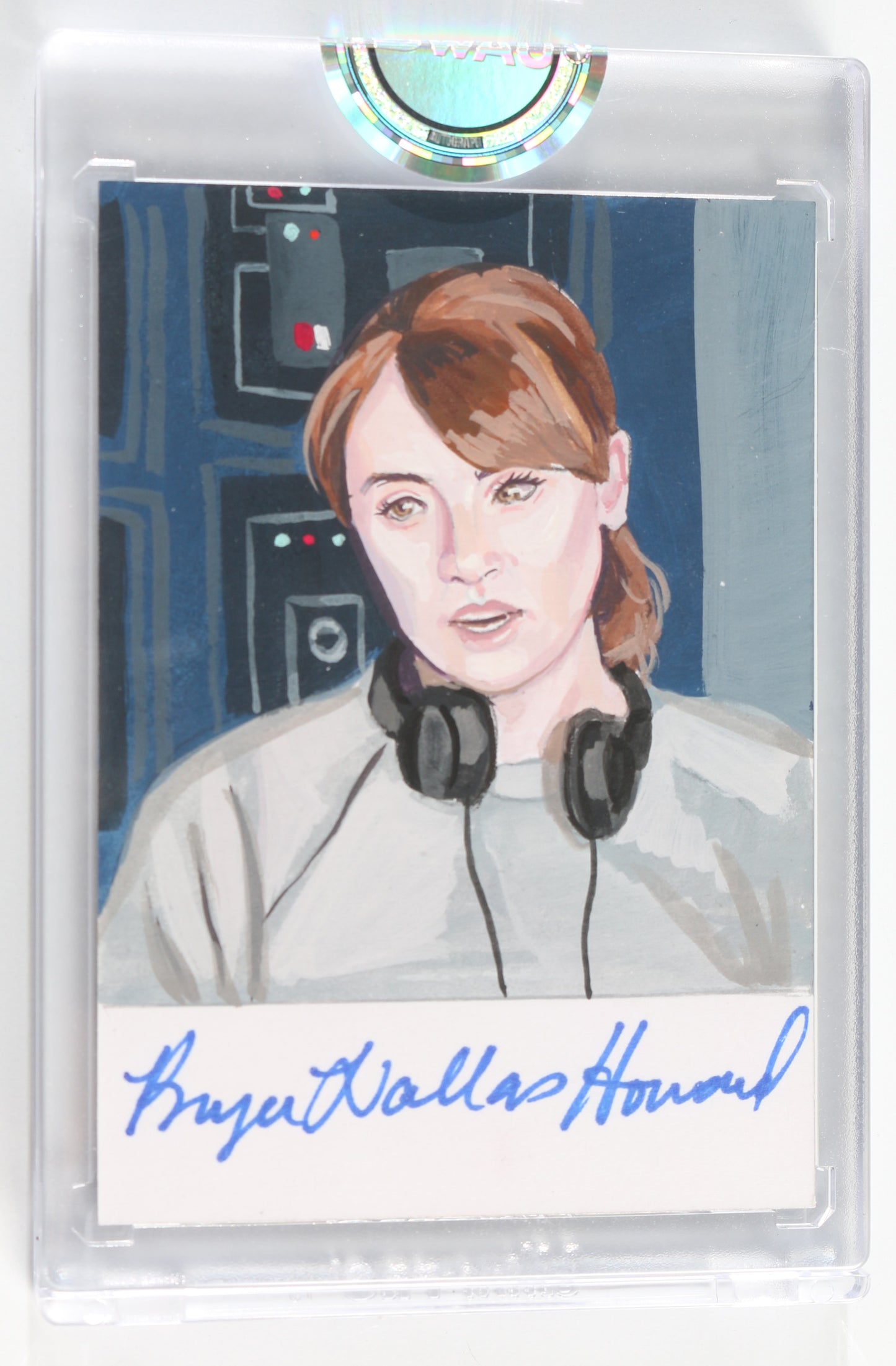 
                  
                    Bryce Dallas Howard Behind The Scenes Directing Star Wars: The Mandalorian (Encapsulated) Signed SWAU Artist Series Trading Card by Candice Dailey
                  
                