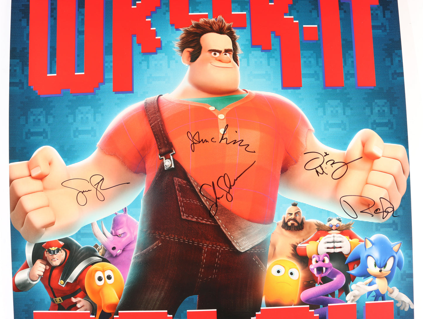 
                  
                    Wreck-It Ralph 27x40 Poster Cast Signed by John C. Reilly, Sarah Silverman, Jane Lynch, Jack McBrayer, and Rich Moore
                  
                