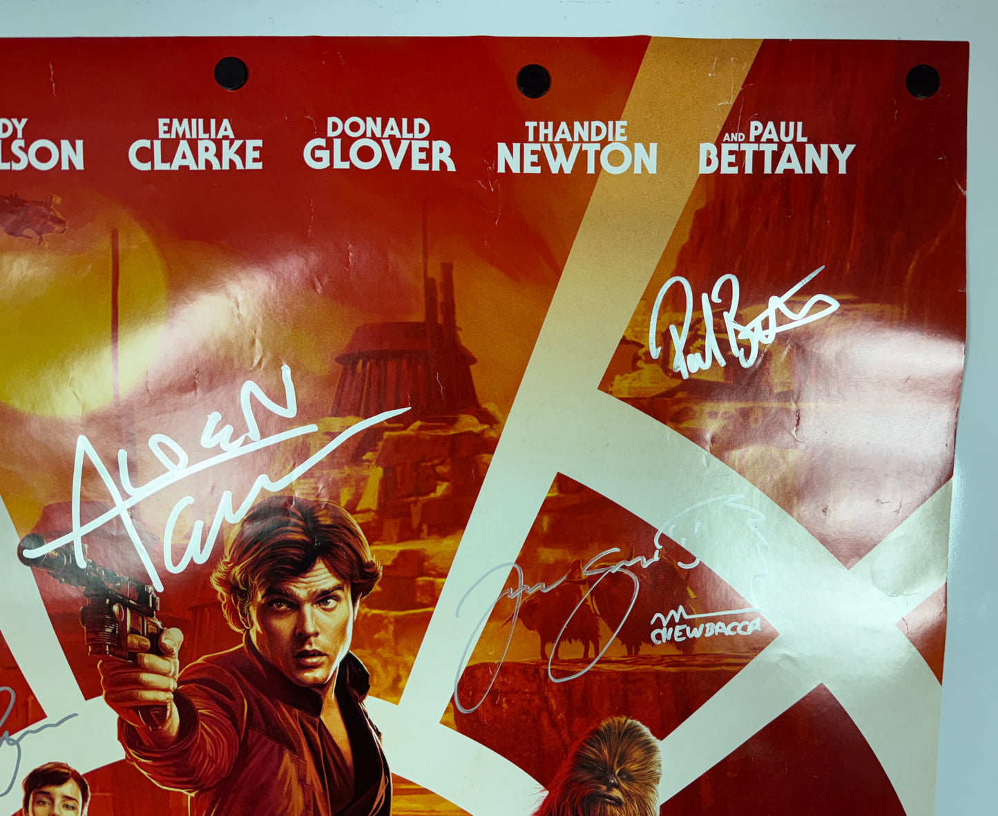 
                  
                    Solo: A Star Wars Story 27x40 Poster (Official Pix / Beckett Witnessed) Cast Signed by Alden Ehrenriech, Paul Bettany, Emilia Clarke, Joonas Suotamo, & Sam Witwer
                  
                
