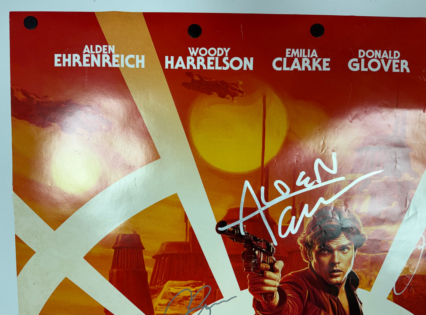 
                  
                    Solo: A Star Wars Story 27x40 Poster (Official Pix / Beckett Witnessed) Cast Signed by Alden Ehrenriech, Paul Bettany, Emilia Clarke, Joonas Suotamo, & Sam Witwer
                  
                