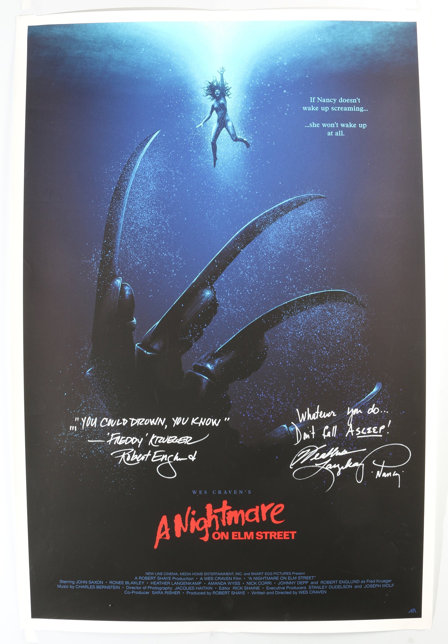 
                  
                    Heather Langenkamp as Nancy Thompson & Robert Englund as Fred "Freddy" Krueger in A Nightmare on Elm Street Signed 24x36 Poster with Character Names & Quotes
                  
                