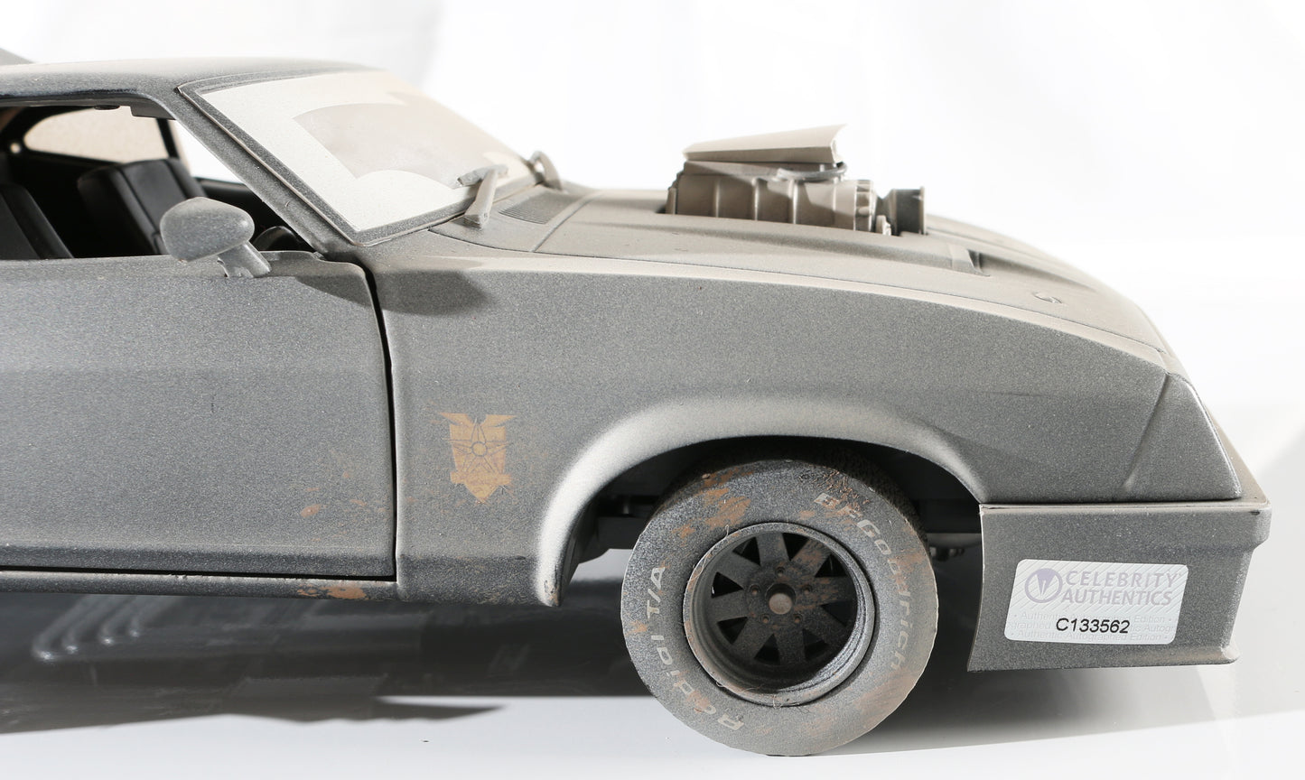 
                  
                    Mel Gibson & Tom Hardy as Max in Mad Max (Celebrity Authentics) Signed Greenlight 1:18 Scale Model 1973 Ford Falcon XB
                  
                