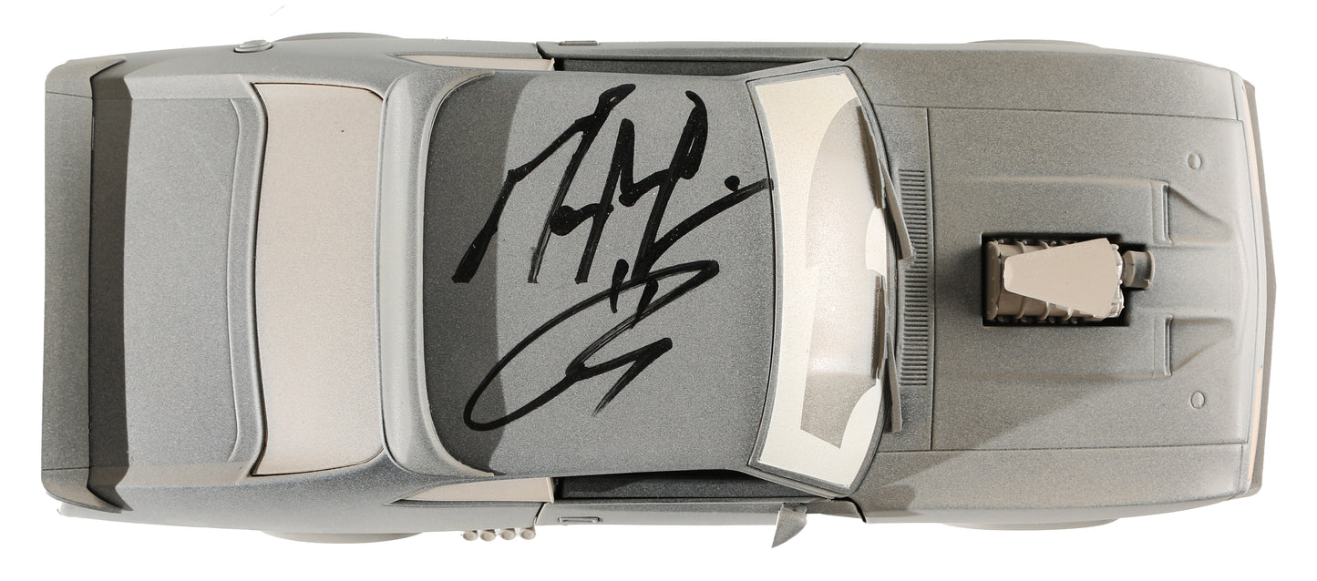 
                  
                    Mel Gibson & Tom Hardy as Max in Mad Max (Celebrity Authentics) Signed Greenlight 1:18 Scale Model 1973 Ford Falcon XB
                  
                