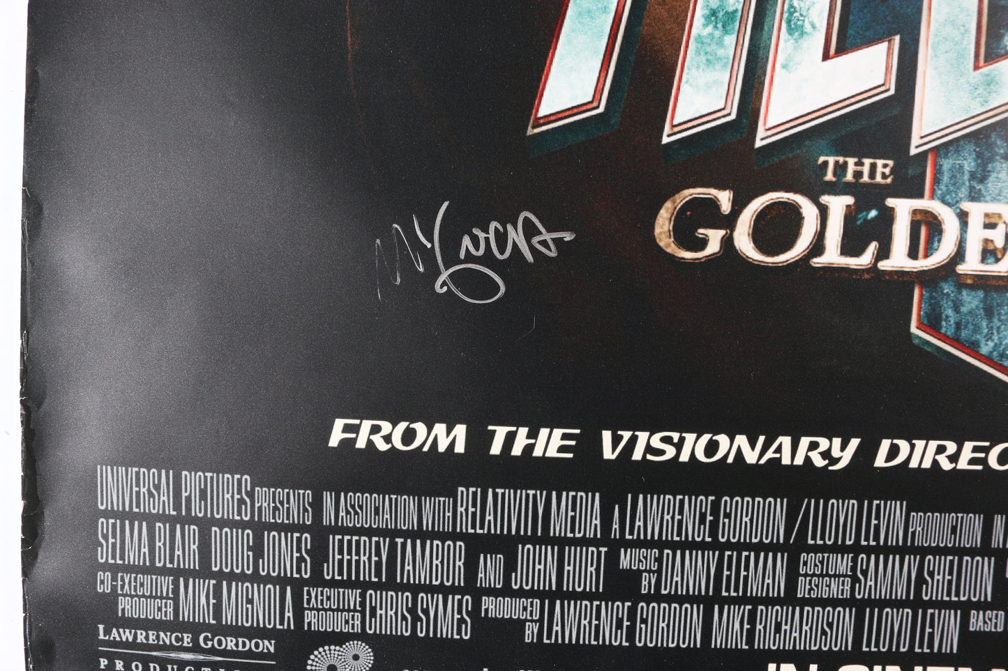 
                  
                    Ron Perlman as Hellboy, Selma Blair as Liz Sherman, & Creator: Mike Mignola in Guillermo del Toro's Hellboy II: The Golden Army Signed 27x40 Poster with Character Names
                  
                