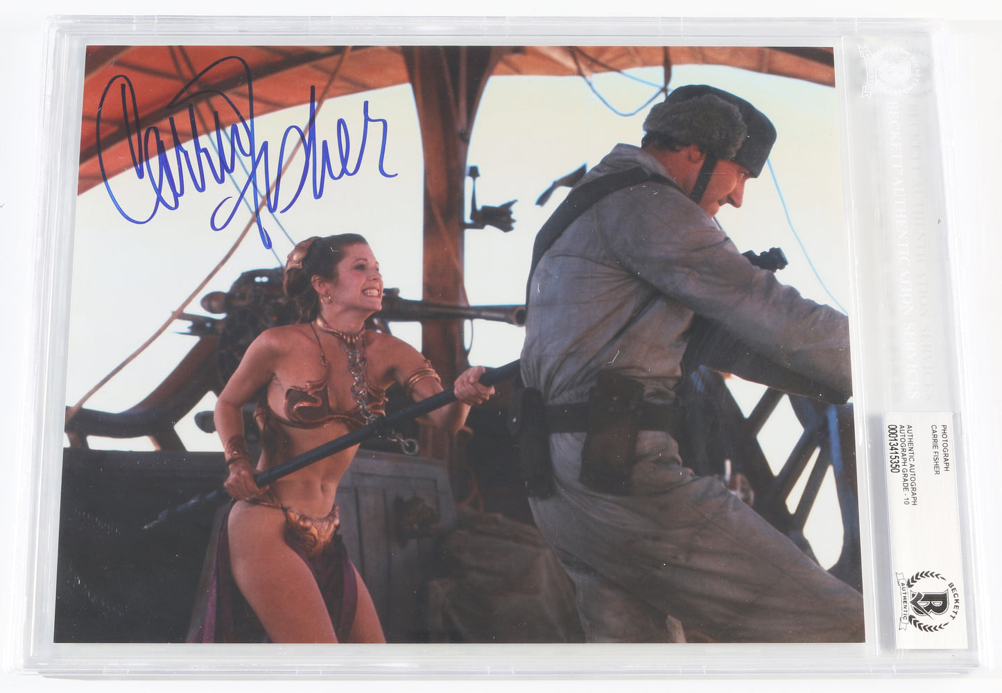 
                  
                    Carrie Fisher as Slave Princess Leia in Star Wars: Return of the Jedi (Beckett Slabbed) Signed 8x10 Photo
                  
                