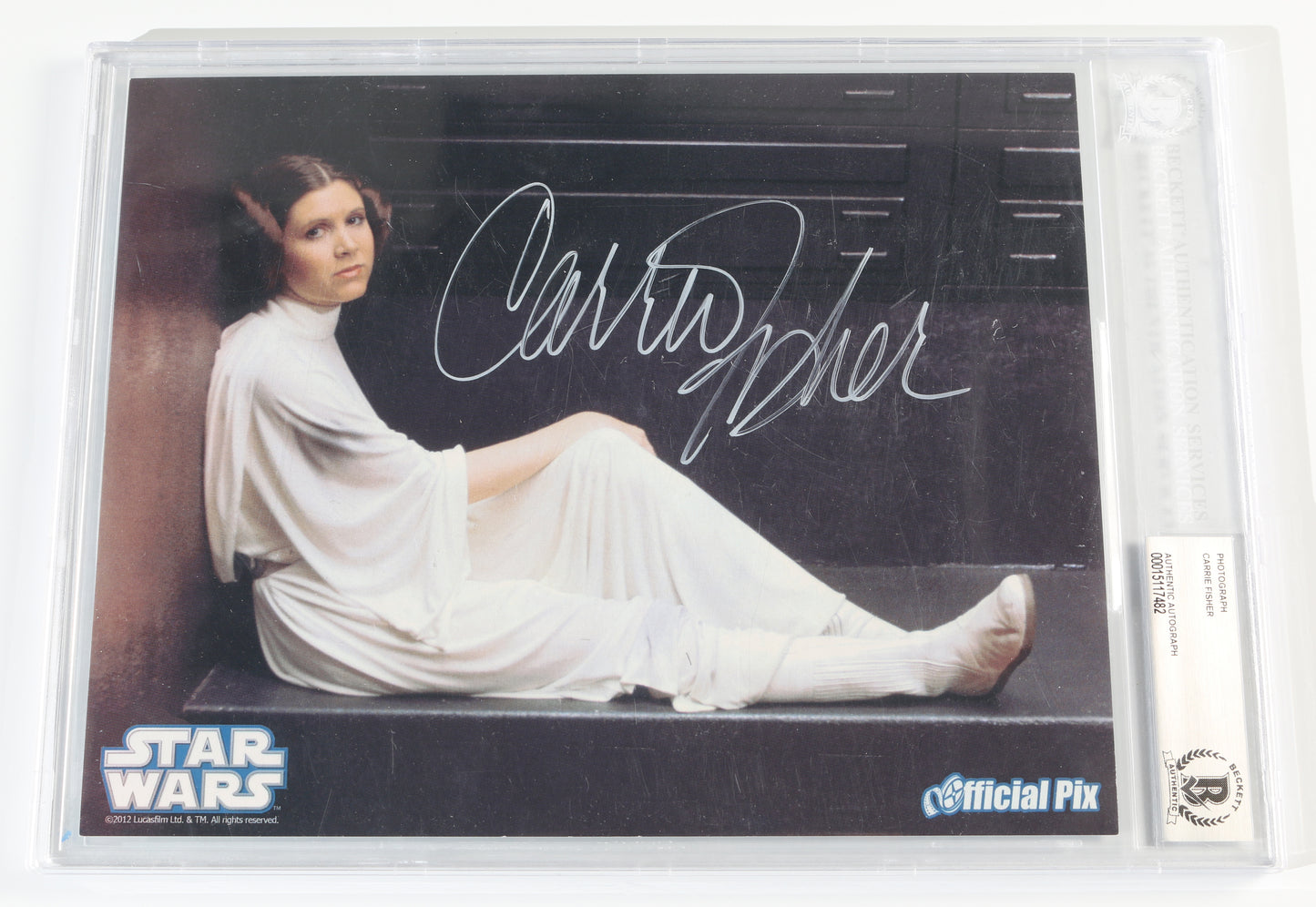
                  
                    Carrie Fisher as Princess Leia in Star Wars: A New Hope (Official Pix / Beckett Slabbed) Signed 8x10 Photo
                  
                