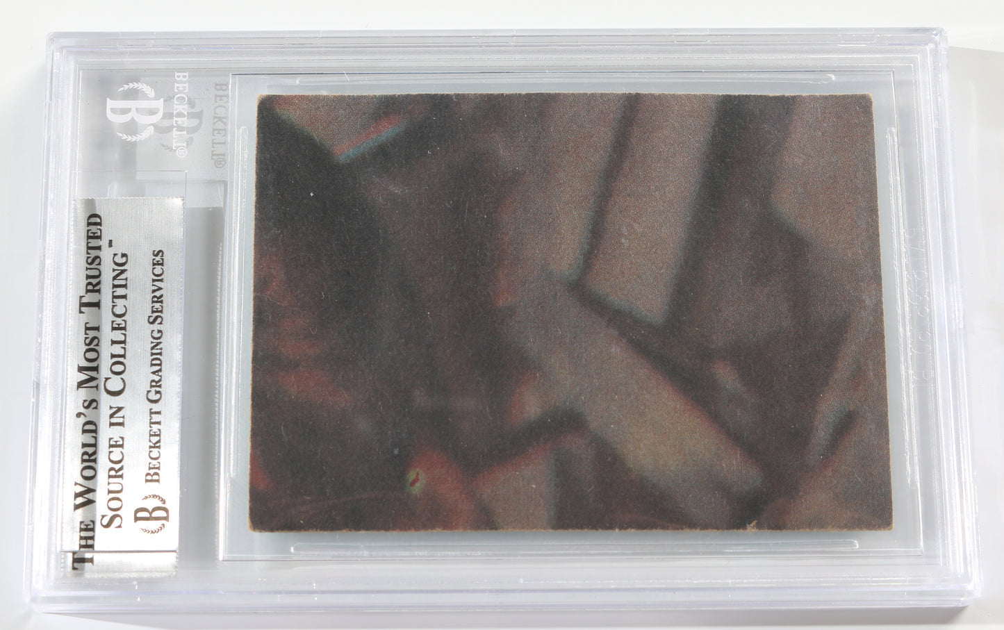 
                  
                    Leslie Schofield as Chief Bast in Star Wars: A New Hope (Beckett Encapsulated) Signed 1977 Trading Card
                  
                