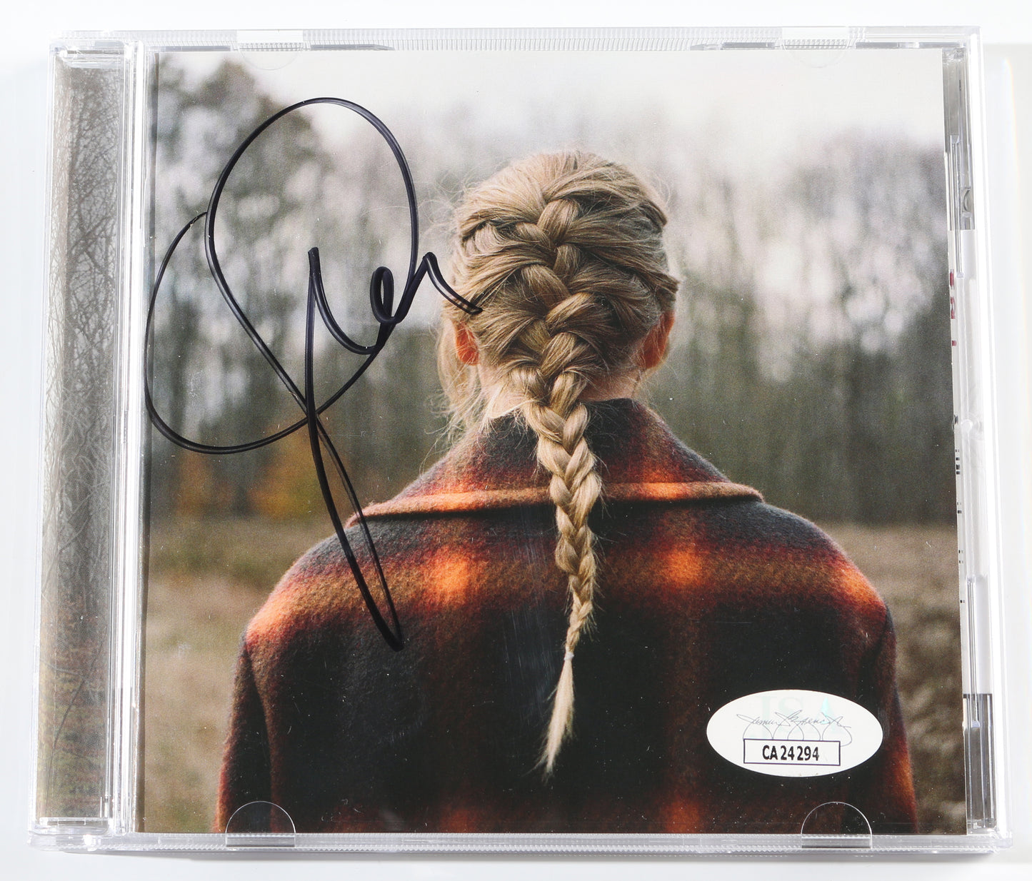 
                  
                    Evermore CD Album with Cover Signed by Taylor Swift
                  
                