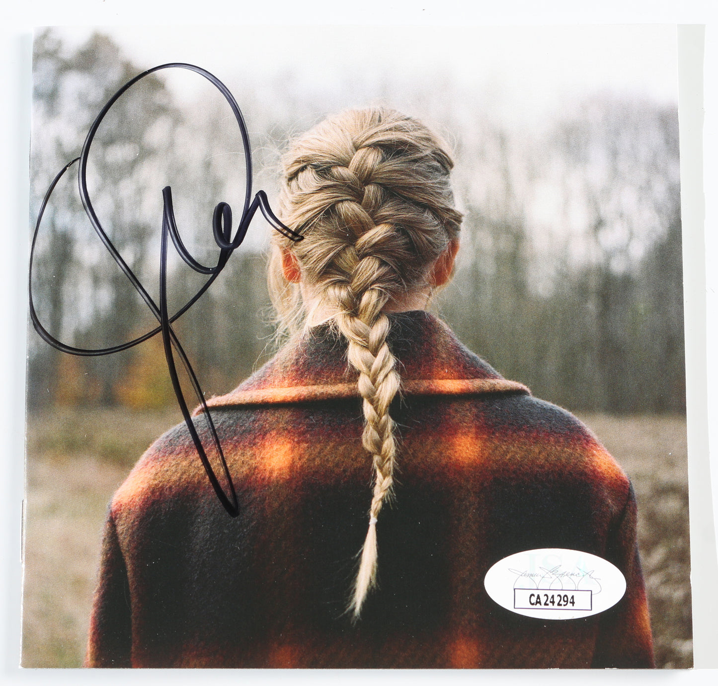 
                  
                    Evermore CD Album with Cover Signed by Taylor Swift
                  
                