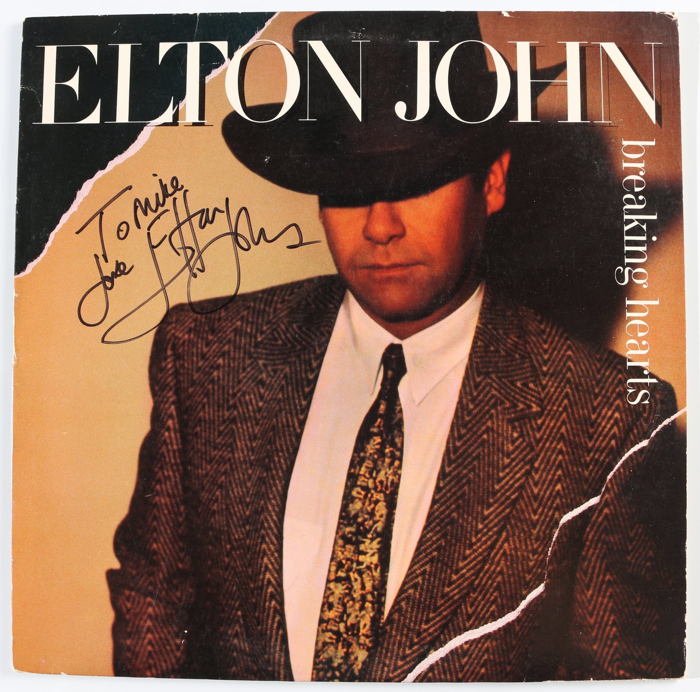 
                  
                    Breaking Hearts LP 12" Vinyl Record Signed by Elton John
                  
                