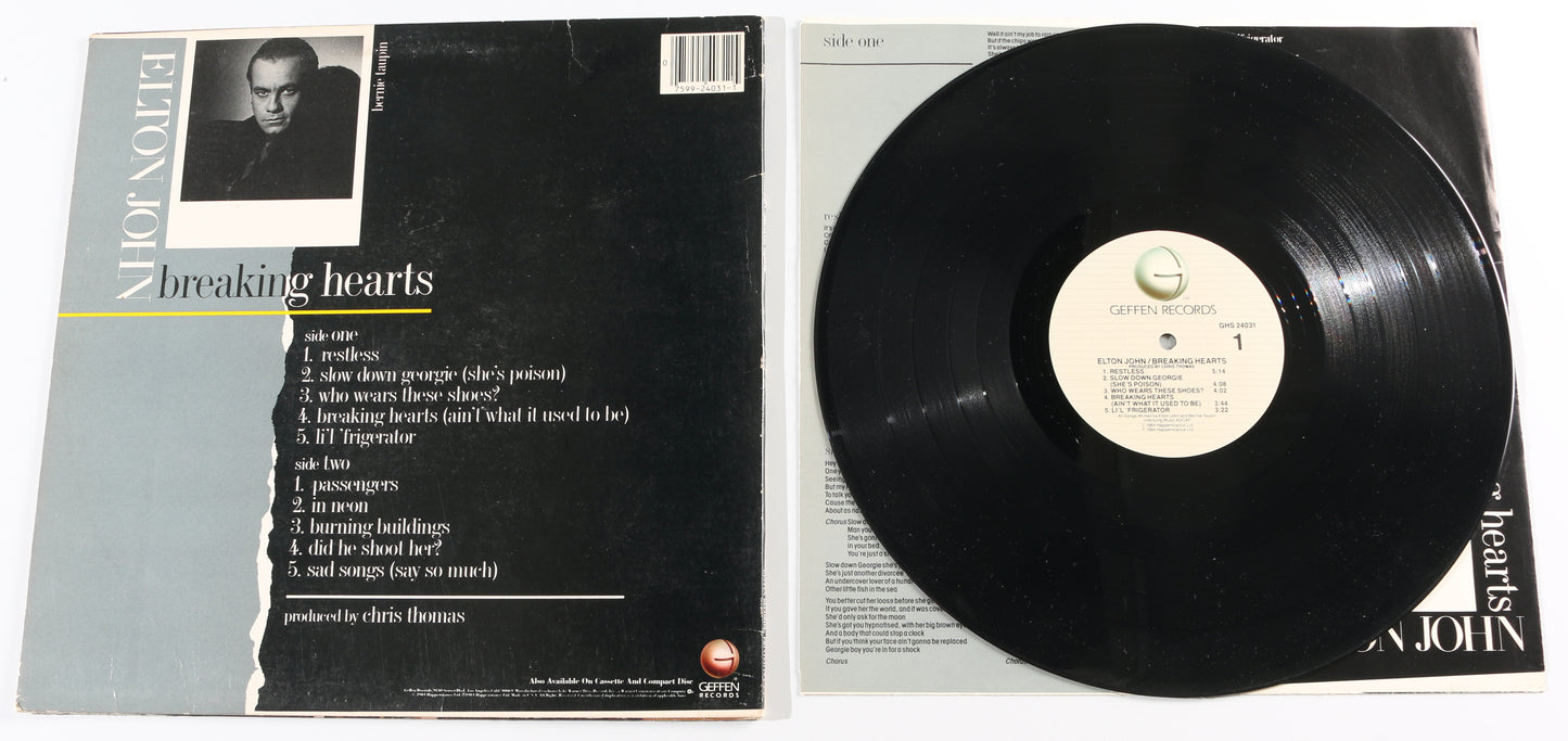 
                  
                    Breaking Hearts LP 12" Vinyl Record Signed by Elton John
                  
                