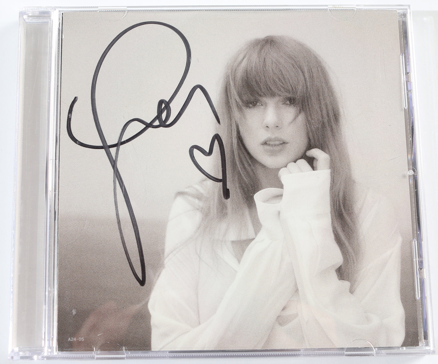 
                  
                    The Tortured Poets Department CD Album Insert Signed by Taylor Swift
                  
                