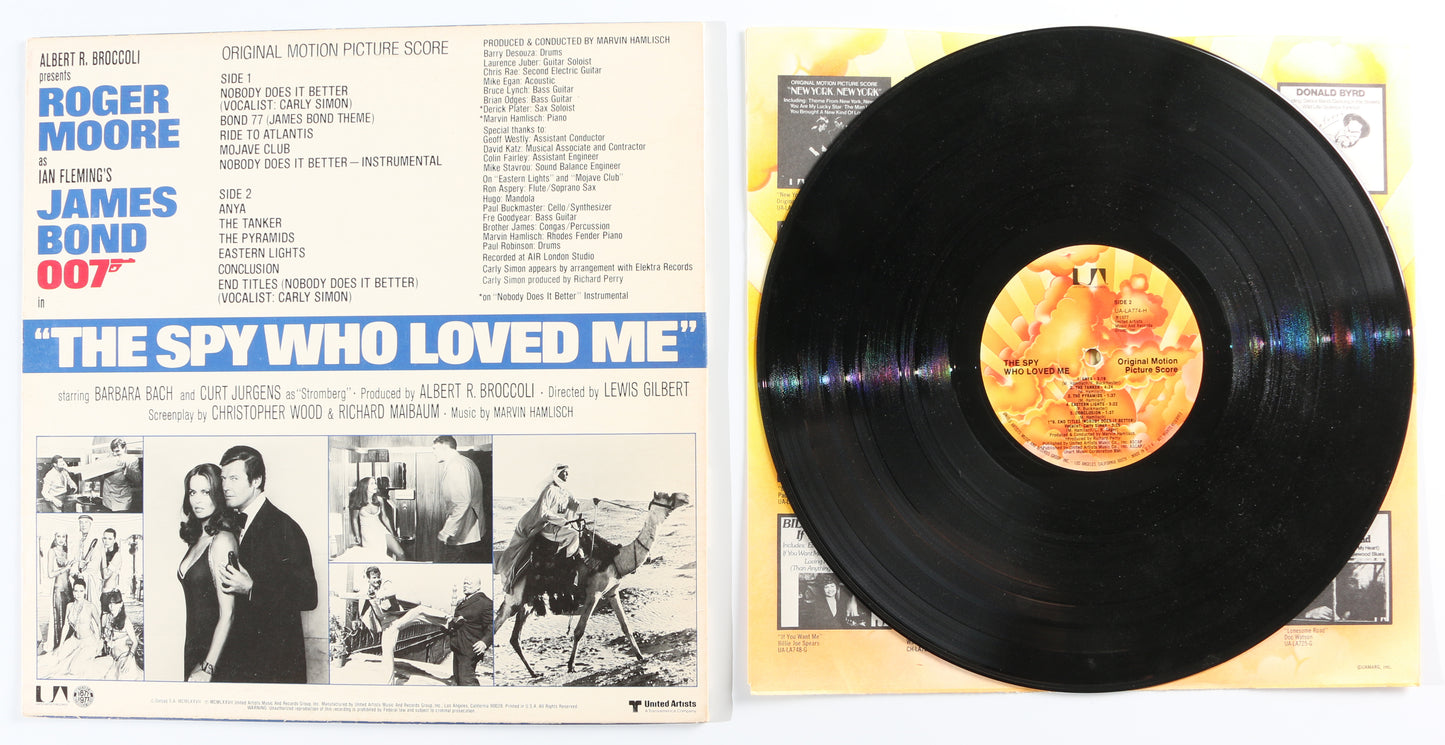
                  
                    Roger Moore as James Bond 007 in The Spy Who Loved Me: Nobody Does It Better Signed 12" Vinyl Record
                  
                