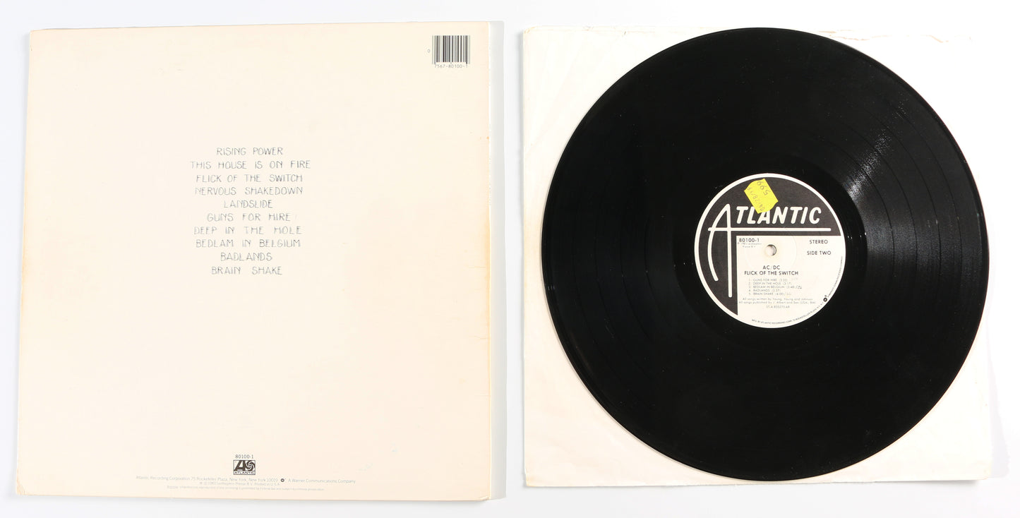 
                  
                    AC/DC: Flick of The Switch LP 12" Vinyl Record Signed by Brian Johnson, Angus Young, Malcom Young, & Cliff Williams
                  
                