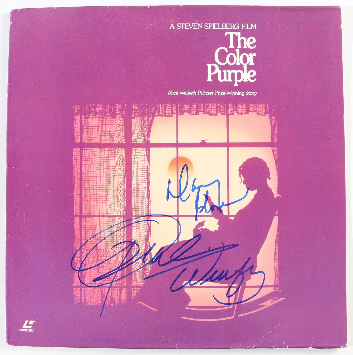 
                  
                    Oprah Winfrey as Sofia & Danny Glover as Mister Johnson in The Color Purple Signed 12"  LaserDisc Cover
                  
                