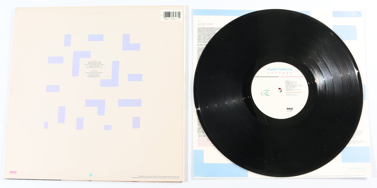 
                  
                    Eurythmics: Revenge 12" Vinyl Record Signed by Annie Lennox & Dave Stewart
                  
                