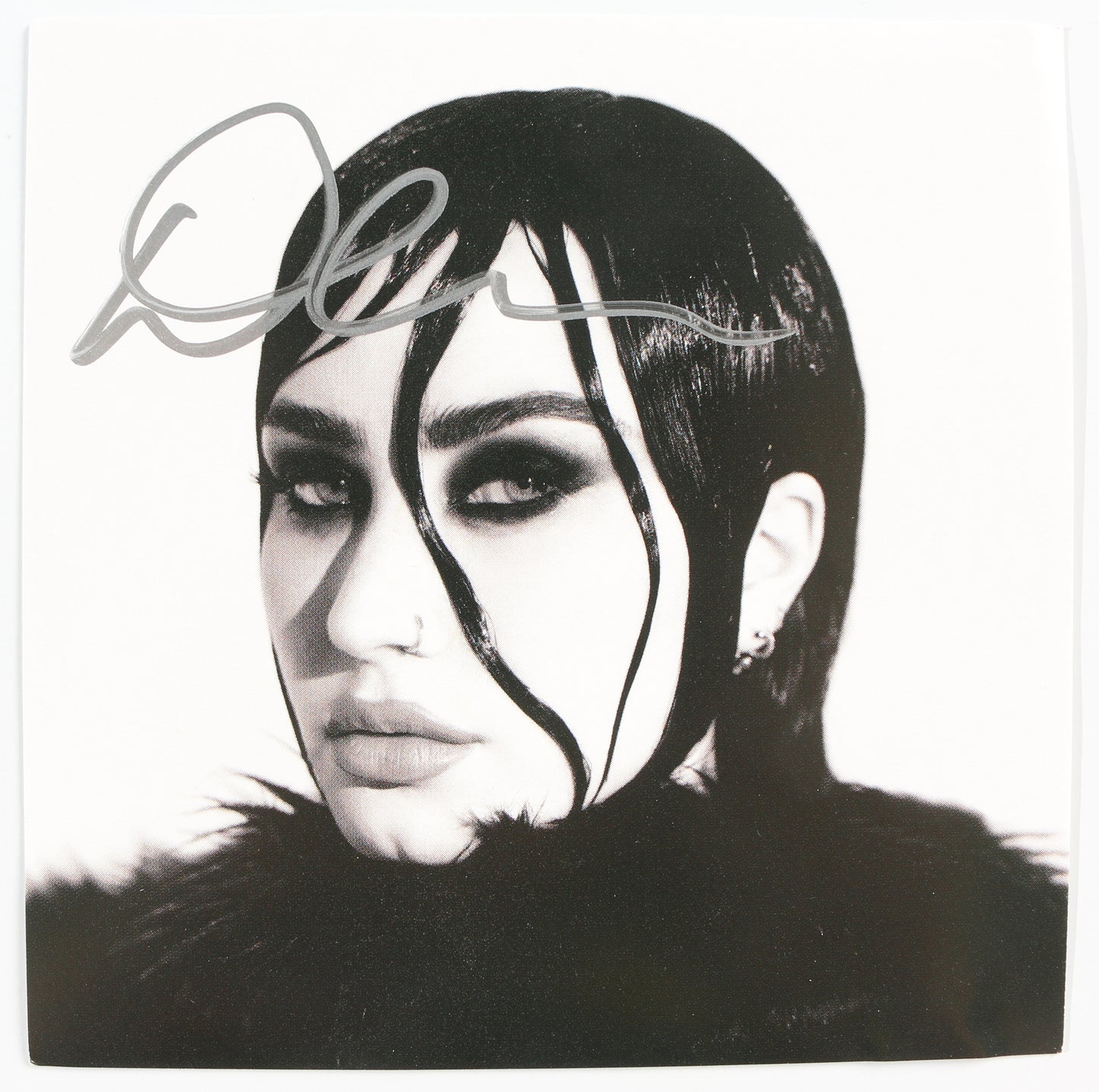
                  
                    Revamped CD Album Insert Signed by Demi Lovato
                  
                