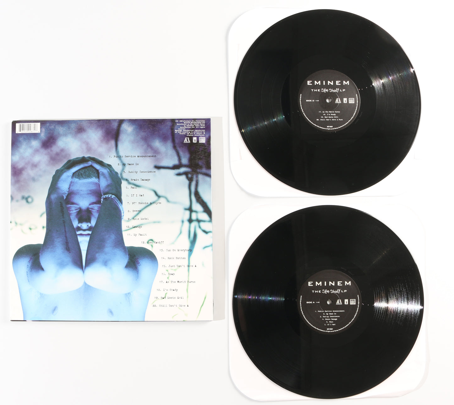 
                  
                    The Slim Shady LP 12" Vinyl Record Signed by Eminem
                  
                
