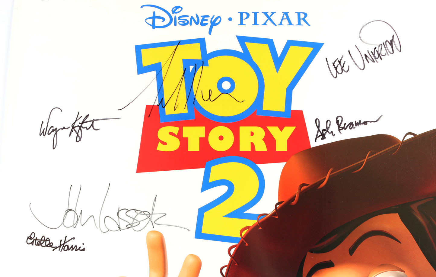 
                  
                    Toy Story 2 Disney Pixar 27x40 Poster Cast Signed by Tom Hank, Tim Allen, Kelsey Grammer, Estelle Harris, Wayne Knight, John Ratzenberger, Composer: Randy Newman, & Directors: Ash Brannon, Lee Unkrich, & John Lasseter
                  
                