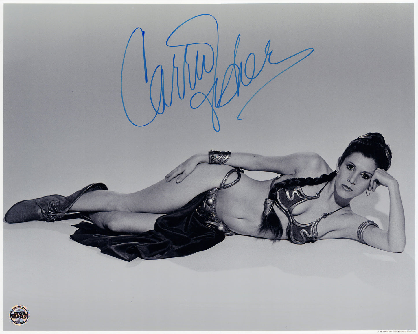 
                  
                    Carrie Fisher as Slave Princess Leia in Star Wars: Return of the Jedi (Official Pix) Signed 16x20 Photo
                  
                