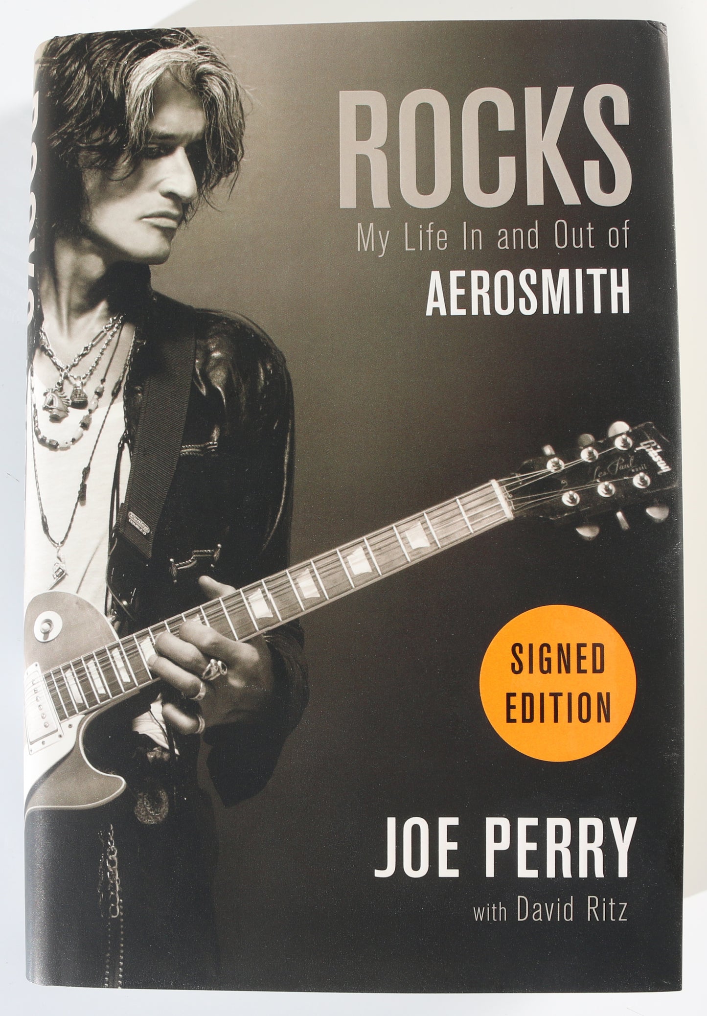 
                  
                    Rocks: My Life In & Out of Aerosmith Hardcover Book Signed by Guitarist of Aerosmith: Joe Perry
                  
                