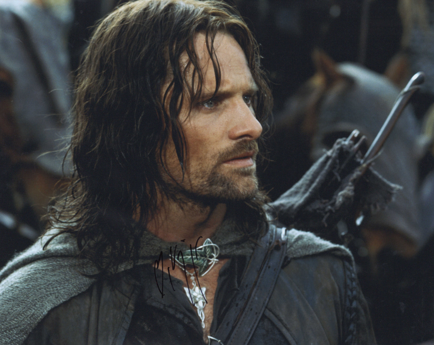 
                  
                    Viggo Mortensen as Aragorn in The Lord of the Rings: The Two Towers Signed 16x20 Photo
                  
                