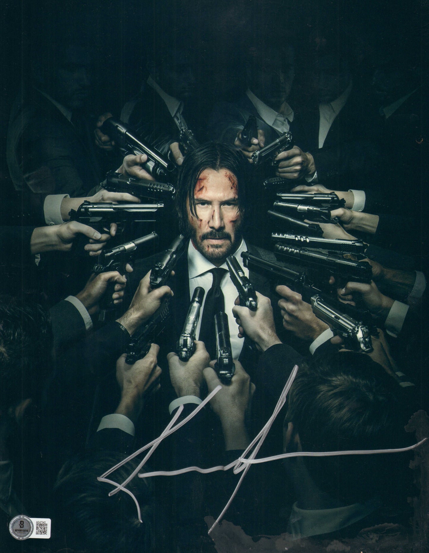 
                  
                    Keanu Reeves as John Wick in John Wick: Chapter 2 (Beckett) Signed 11x14 Metallic Photo
                  
                